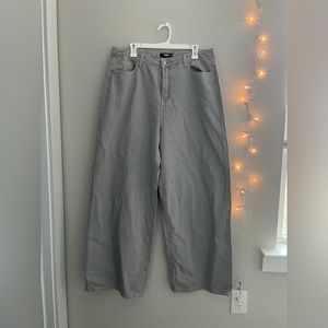 Grey, wide-leg jeans.